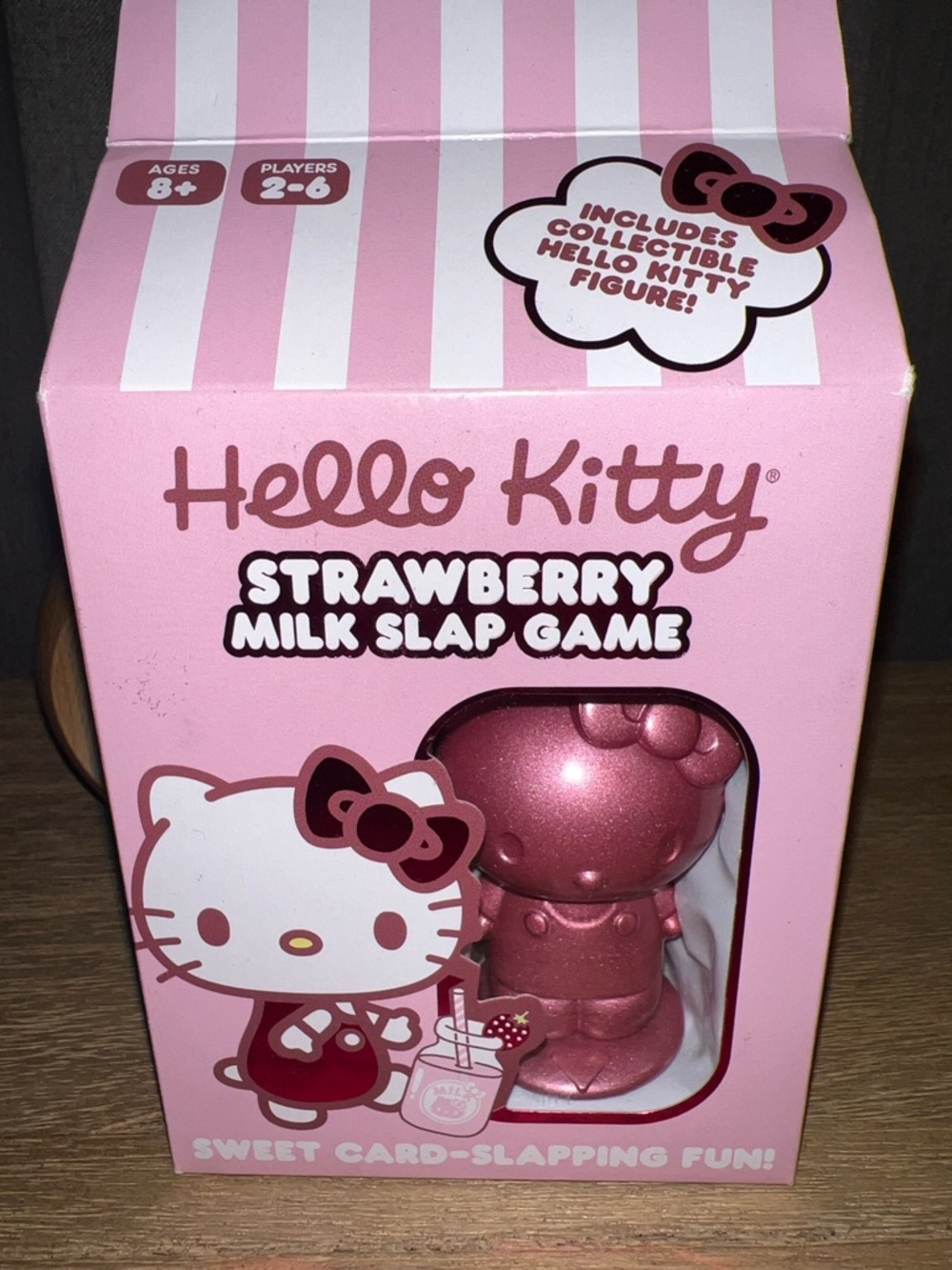 Hello Kitty Pink Strawberry Milk Slap Game with Collectible Figure